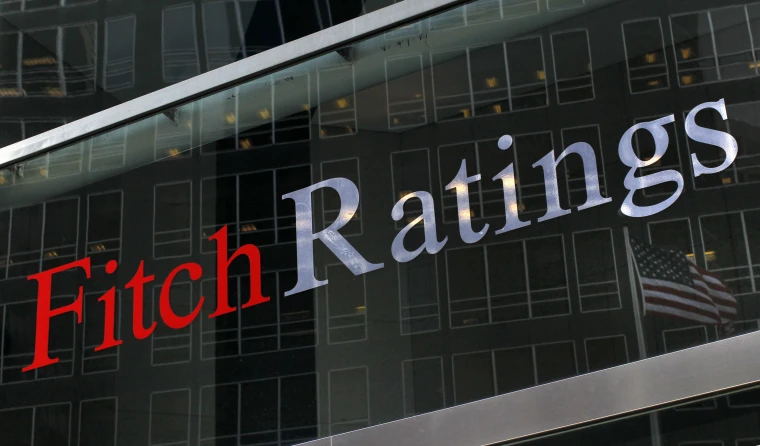 Fitch warns it may be forced to downgrade dozens of banks, including JPMorgan Chase