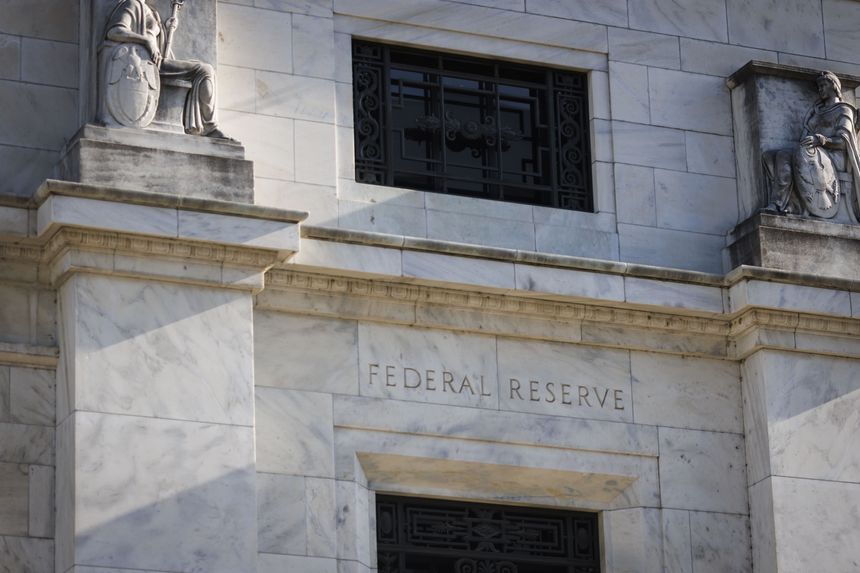 The Fed keeps interest rates unchanged, signaling it may raise rates again this year